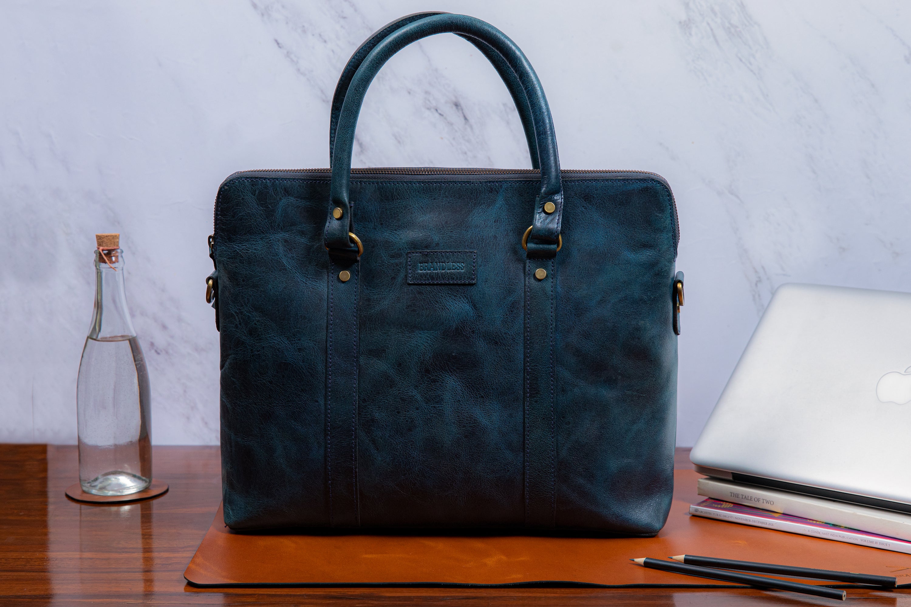 Printd Luxurious Leather Laptop Bag With Circular Modern Design – Creative  Dukaan